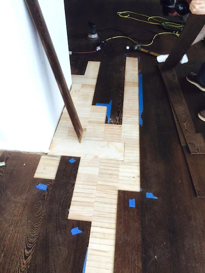 The flooring with the veneers removed.