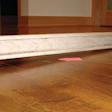 A compelling reason to check for flatness before starting: At this old home, the exterior walls had settled, creating this drastic slope in the wood floor. (All photos courtesy of Roy Reichow)