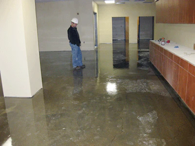 An unidentified powder has contaminated the primer that was applied to this slab.