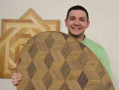 Toby Merrill with a medallion he made at an NWFA school. Merrill is a new NWFA Regional Instructor.