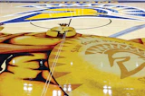 Larger-than-life metallic Spartans on the new San Jose State University basketball floor created an out-of-the-box challenge for United Services Inc. (Courtesy San Jose State University)