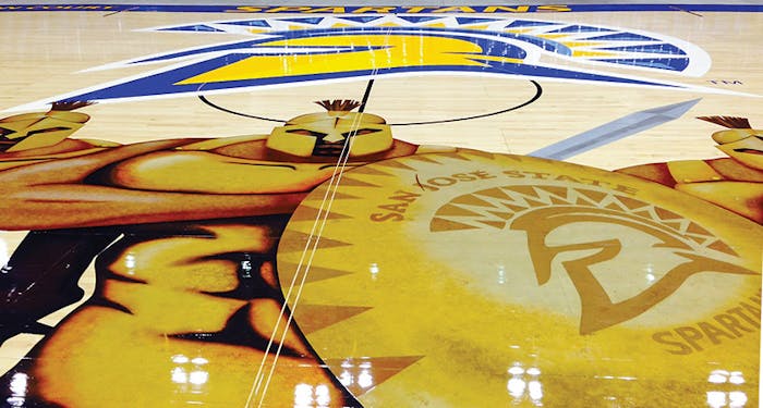 Larger-than-life metallic Spartans on the new San Jose State University basketball floor created an out-of-the-box challenge for United Floor Services Inc. (Courtesy San Jose State University)