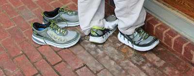 Graham takes his shoes off outside the home. The coworkers have matching Hoka One Ones, which won’t win any runway contests but are comfortable after taking thousands of steps per day, Gilbert says.