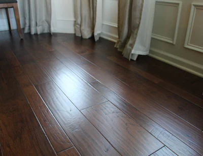 For this 1,547-square-foot floor, the homeowner was going to use flooring he bought from a liquidator, but there were three sheens in the box.