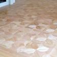 This parquet pattern crafted from waste became the showpiece of the customer's home.