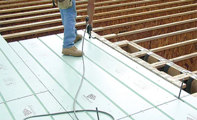 This engineered product is a structural flooring element with a highly conductive aluminum face that spreads out heat, helping avoid hot spots. (Photo courtesy of Warmboard)