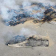 Spontaneous combustion in the wood flooring industry most commonly comes from two causes: stain rags or (shown here) bags of wood floor dust. (Photo courtesy of Josh Hansman)