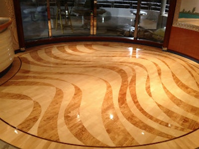 Allstate Flooring sanded and finished this 2013 Wood Floor of the Year Award-winning floor installed by Czar Floors.