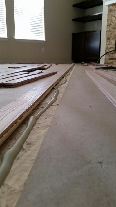 5 12 Firstrowinglueonsubfloor