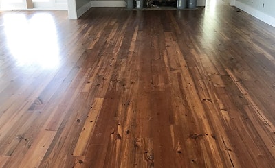 Pine floors are part of our everyday business. This is a reclaimed heart pine floor common to our area. It is a first- and second-grade mix that we supplied, installed, sanded flat and finished with a satin oil-modified polyurethane.