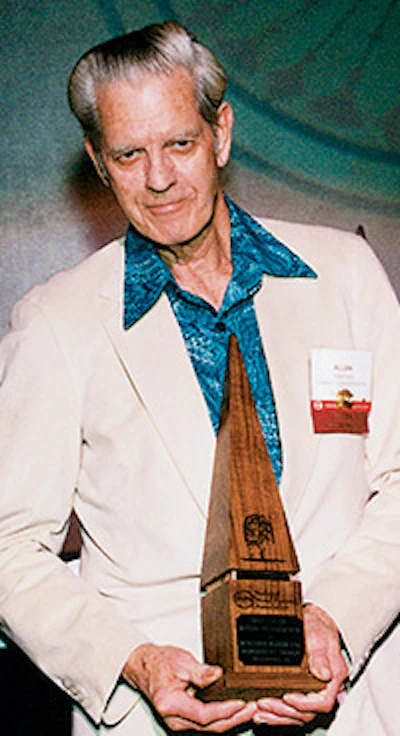 Allan Pyne with one of his multiple awards for stunning wood floors.