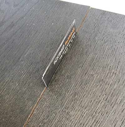When we know flooring is undersized at installation, sometimes business-card-sized gaps are all we need to avoid trouble later.