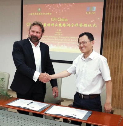 Robert Varden, CFI, and Chun Yuan Qi of Shanghai Chemical Building Materials Trade Association, at the CFI China Signing Ceremony.