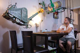 Zoltan Boros hoisted his wood flooring machines up toward the dining room ceiling in case his house flooded.