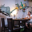Zoltan Boros hoisted his wood flooring machines up toward the dining room ceiling in case his house flooded.