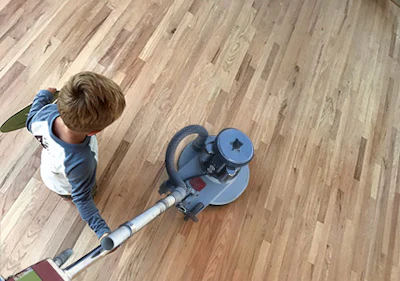 Cody Griffith's son, Connor Griffith, helps his dad on the job site.