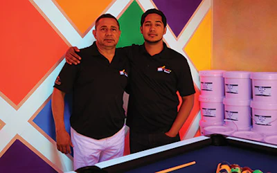 Top (L-R): The Glowry floor in daylight and how it looks under black light. Center: A bedroom with green Glowry finish illuminates in the dark. Bottom: Glowry creators Carlos Mongalo Sr. and Carlos Mongalo Jr. of Miami-based Mongalo Designs.