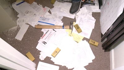 Old to Gold Hardwood Floors' foam gold bars strewn about the floor after the break-in. Source: FOX 17