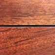 A Brazilian cherry wood floor showing gaps between boards.