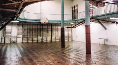 The basketball court, located in the basement of a YMCA in Paris, has suffered severe moisture damage over the years. A GoFundMe page has also been started to help restore it to its original glory. Photo credit: Juli Etta Photography.