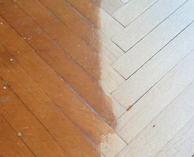 This closeup above shows the original coating (on the left) beside wood cleaned of all surface accumulations without sanding.