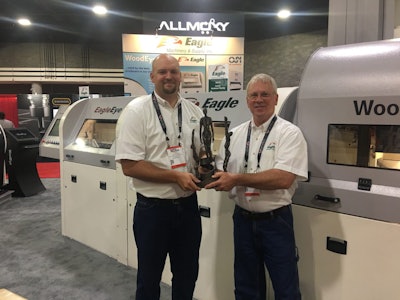 Todd Spillman (left) and Kirk Spillman of Eagle Machinery recieve the Challengers Distinguished Achievement Award at IWF.