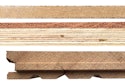 Do your customers understand the realistic expectations for their flooring and its wear layer? At top, one of the newer hybrid-type products that has an actual wood veneer—a wear layer or 0.6 mm—and an HDF core. This product may be (carefully) abraded and recoated. Middle, an engineered wood floor with a 4.2-mm wear layer over Baltic birch plywood; even though it is engineered this floor can be sanded and refinished. Bottom, a solid piece of 3⁄4-inch-thick red oak flooring that can be resanded multiple times by a pro.