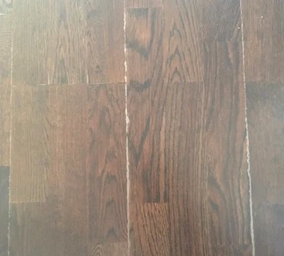 The top layer of this oil-modified urethane is peeling off due to insufficient dry time of the coat underneath and a lack of abrasion.