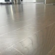 What looks like white lines on this floor is peeling of the two-component water-based finish due to insufficient stain dry time.