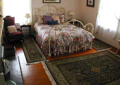 A bedroom featuring the Douglas fir flooring in the lighthouse. Photo courtesy of Tom Butt