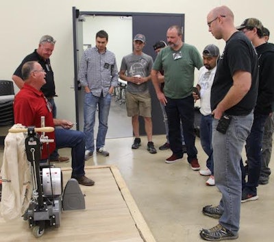 Daniel Boone (left) teaches at an American Sanders Sand & Finish class in September 2018.