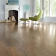 The custom white oak floor above was created by using one coat of Craft Oil 2K Clay; one coat of Craft Oil 2K Ash, wire-brushing and steel plates; then a topcoat of Bona Traffic HD.
