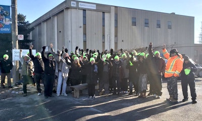 Employees at Satin Flooring set up a picket line in front of the company Dec. 7. Source: Teamsters Canada