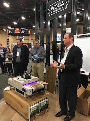 The new WOCA USA coating system is demonstrated during TISE 2019.
