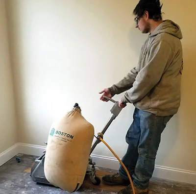 Rick St. Pierre, 19, started working at Patriot Floor Surfacing in high school, and was hired full-time after graduating.
