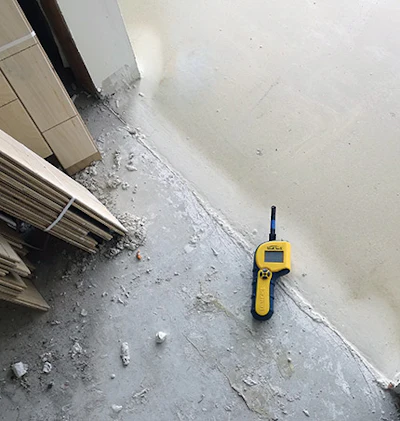 By the time I inspected this job site, the buckling flooring had already been demo'd due to the tight construction timeline.