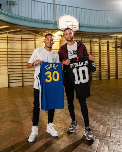 Neymar Jr. (left) and Stephen Curry on the world's oldest basketball court, located in Paris. (Photo courtesy of YMCA-UCJG de Paris)