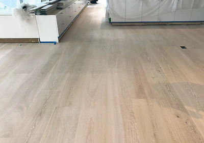 The final result was a floor that has the soothing, uniform look the client was seeking. Although the individual boards don't run the entire length of the floor, the final effect is seamless.
