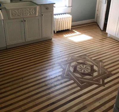 Numerous different flooring patterns can be found throughout the home. (Image: William Witten Home Facebook page)