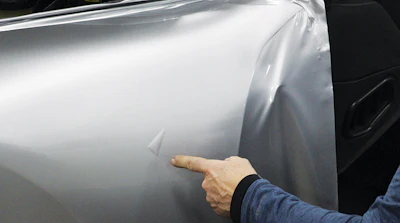 Hagen points out an air bubble that can form during an installation.