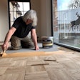 Wood floor pro Filip Redant installs a typical subfloor in Belgium.