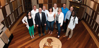 The staff of Woodchuck Flooring in the company's Toronto showroom.