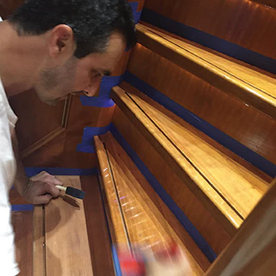 In the stairs on this yacht they had a small rubber inlaid piece in the front of the treads; we had to remove those and be careful to not fill in the void so it could be re-inserted.