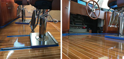 We go through tons of blue tape! On this yacht they had done a complete remodel, and we resanded areas including this pilot house. You can see that those chairs go back and forth. They use a hydraulic system with a black belt on the front of the chair, so we had to be careful to not get finish on anything.