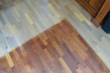 Given enough time in direct sun, most woods will fade to a silvery-gray color; this merbau floor had a drastic color change in just three years. (Photo courtesy Courtesy of Roy Reichow)
