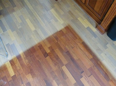 Given enough time in direct sun, most woods will fade to a silvery-gray color; this merbau floor had a drastic color change in just three years. (Photo courtesy Courtesy of Roy Reichow)