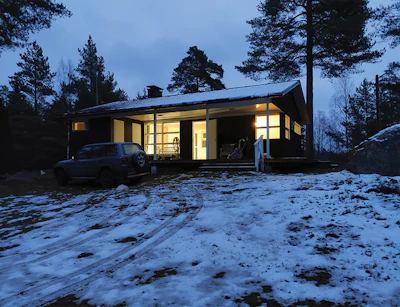 Summer houses are common here and many of my jobs are floors that are rarely used, so winter is downtime and is a good time for maintenance. We have a maximum of six hours of light in winter, so work lights are a must (this photo shows one of my jobs at 3:20 p.m.). This project had a dirt road with clear ice, and I nearly drove off the road. When finished, there was a red fox, a deer running in headlights and a huge moose walked by the road—all in that one trip.