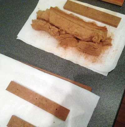 The contrast in water-resistant HDF and regular HDF: at top, what happens to regular HDF when you boil it for one hour. Bottom, water-resistant HDF after being boiled for the same period of time.
