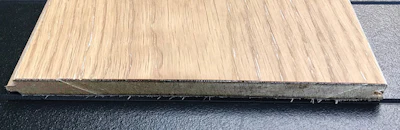 A hardwood face with a water-resistant HDF core.