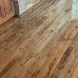 Contrary to popular belief, the sheens of previous coats won't affect the sheen of the final topcoat (but they might affect clarity). Courtesy of Nature Floors, Layton, Utah